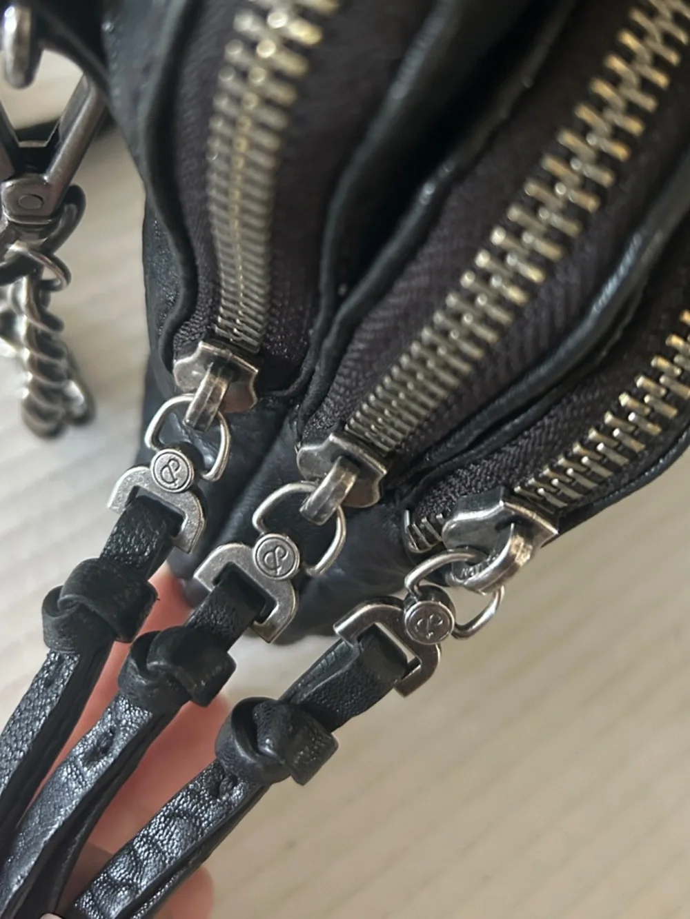 Treasure & Bond Black Leather triple -Zip Crossbody with Chain Tassel